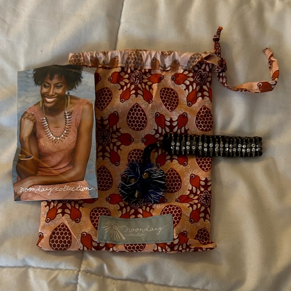 Noonday Collection bracelet and Floral Cosmetic Bag - Red and Orange